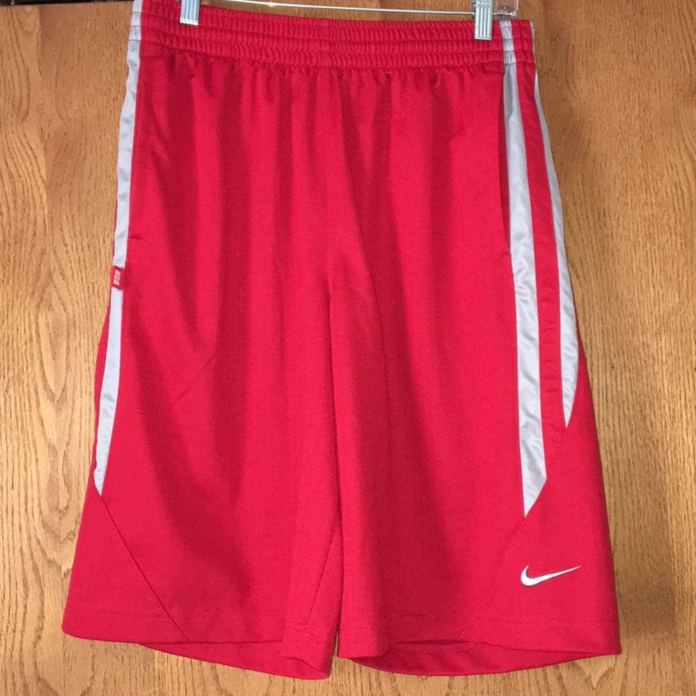 Red Nike shorts